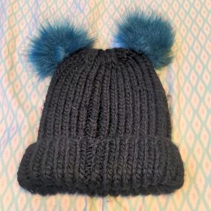 Black with 2 blue pom poms by rampage one size and can fit both women/child